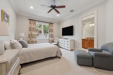 Elegant  2-story residence sited on private lushly-landscaped