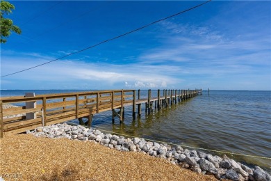 Re-listed with a PRICE IMPROVEMENT! This Bokeelia home is a rare