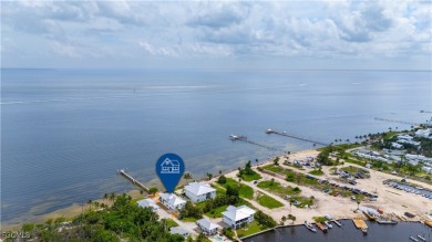 Re-listed with a PRICE IMPROVEMENT! This Bokeelia home is a rare