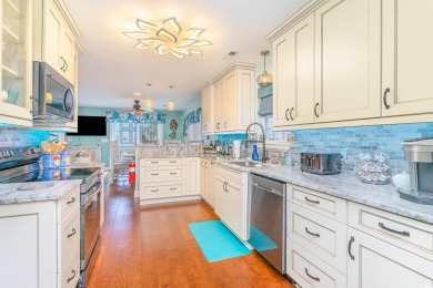 Just steps from the beach, this turn-key 2nd row home offers the