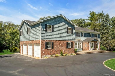 Welcome to 20 Rolling Drive, Glen Head, NY - Set on a pristine 2
