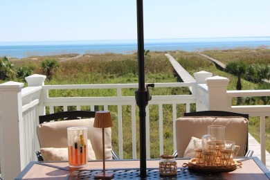 Set on an expansive 1.15-acre gulf-front lot, this extraordinary