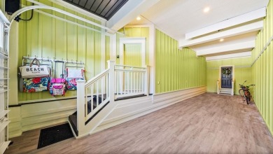 Set on an expansive 1.15-acre gulf-front lot, this extraordinary