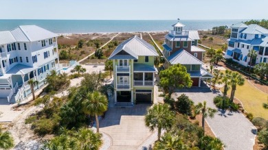 Set on an expansive 1.15-acre gulf-front lot, this extraordinary