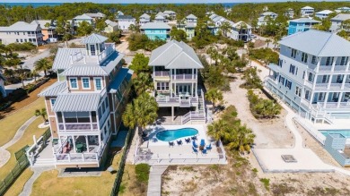 Set on an expansive 1.15-acre gulf-front lot, this extraordinary