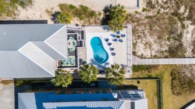 Set on an expansive 1.15-acre gulf-front lot, this extraordinary