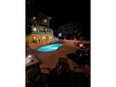 Set on an expansive 1.15-acre gulf-front lot, this extraordinary