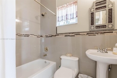 A Home of Distinction! This custom-designed Mediterranean style