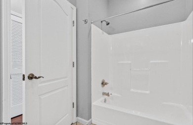 Check out this fantastic corner unit adjacent to the elevator!