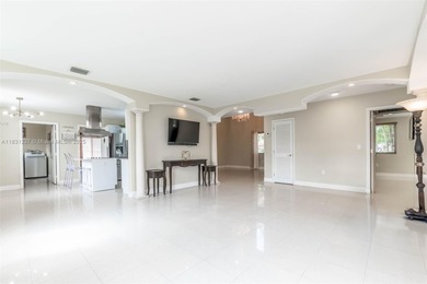 A Home of Distinction! This custom-designed Mediterranean style