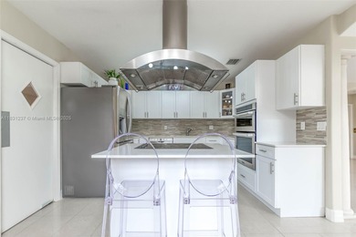 A Home of Distinction! This custom-designed Mediterranean style