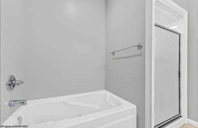 Check out this fantastic corner unit adjacent to the elevator!