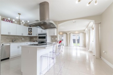 A Home of Distinction! This custom-designed Mediterranean style