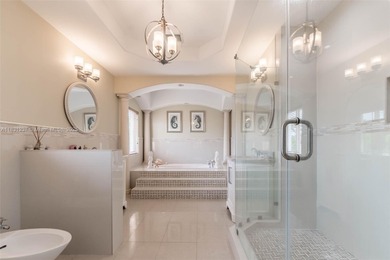 A Home of Distinction! This custom-designed Mediterranean style