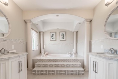 A Home of Distinction! This custom-designed Mediterranean style