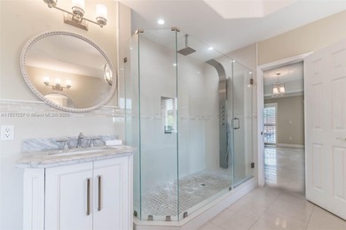 A Home of Distinction! This custom-designed Mediterranean style