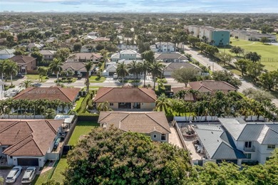 A Home of Distinction! This custom-designed Mediterranean style