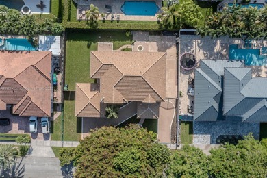 A Home of Distinction! This custom-designed Mediterranean style