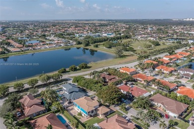 A Home of Distinction! This custom-designed Mediterranean style