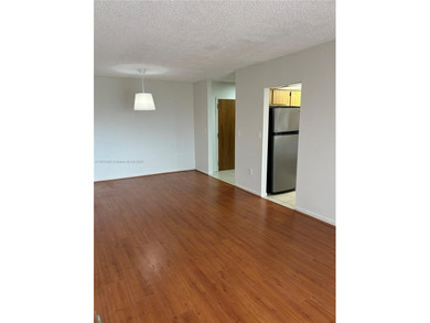 Located in the private, gated community of Miller Gardens, this