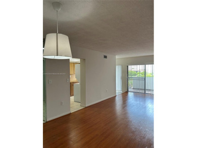 Located in the private, gated community of Miller Gardens, this