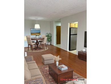 Located in the private, gated community of Miller Gardens, this