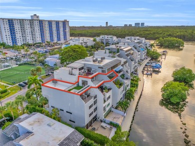 Live on a private, guarded island in Sunny Isles at Poinciana