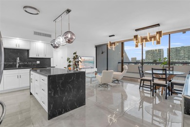 Live on a private, guarded island in Sunny Isles at Poinciana