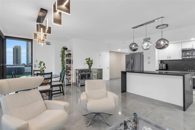 Live on a private, guarded island in Sunny Isles at Poinciana