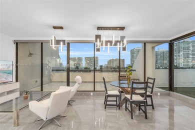 Live on a private, guarded island in Sunny Isles at Poinciana