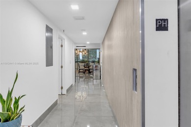 Live on a private, guarded island in Sunny Isles at Poinciana