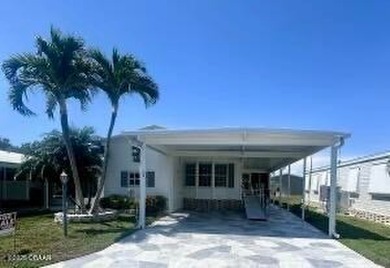 This immaculate home in a 55-plus community is move-in ready and