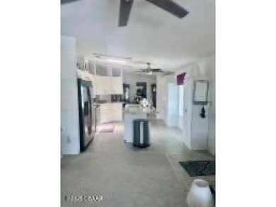 This immaculate home in a 55-plus community is move-in ready and