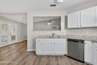 Located in the Fort Hammocks of Arlington, this spacious