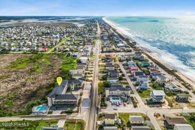 Experience coastal living at its finest with this stunning