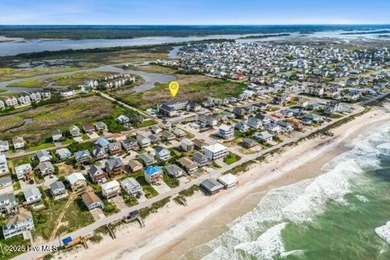 Experience coastal living at its finest with this stunning