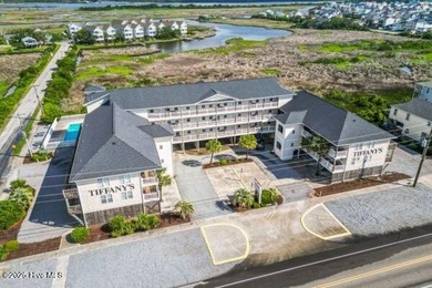 Experience coastal living at its finest with this stunning