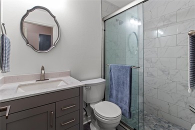 PRICE REDUCTION!!! A MUST SEE, THIS RENOVATED CONDOMINIUM