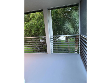 Experience the best of Pine Island Ridge in this spacious rarely