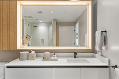 Designer-curated North East Corner residence! This sought-after