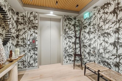 Designer-curated North East Corner residence! This sought-after