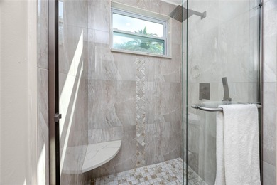 STUNNING CORNER UNIT & GOLFER'S DREAM!This completely remodeled