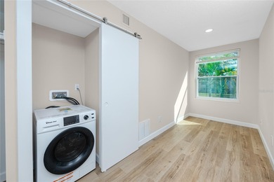 STUNNING CORNER UNIT & GOLFER'S DREAM!This completely remodeled