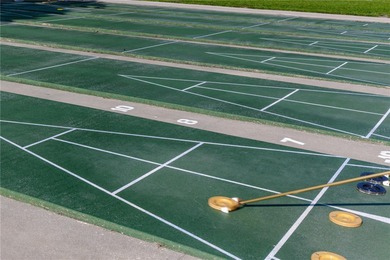 STUNNING CORNER UNIT & GOLFER'S DREAM!This completely remodeled