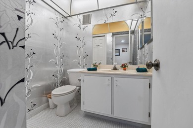 Just listed in the highly desirable Country Club Apartments at