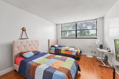 Just listed in the highly desirable Country Club Apartments at