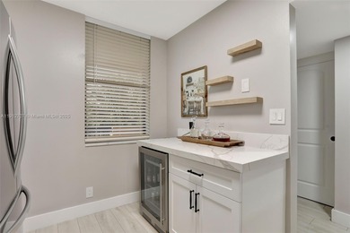 This stunning unit has been completely gutted & fully remodeled