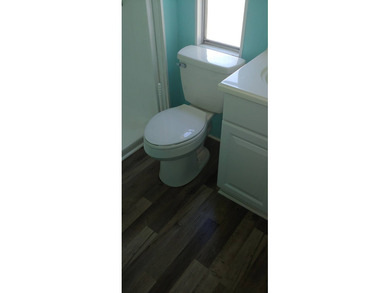 Price:  $54,900.00  ~  Monthly Lot Lease:  $610.00  ~  Monthly