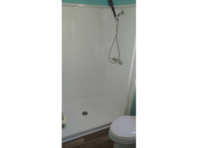 Price:  $54,900.00  ~  Monthly Lot Lease:  $610.00  ~  Monthly