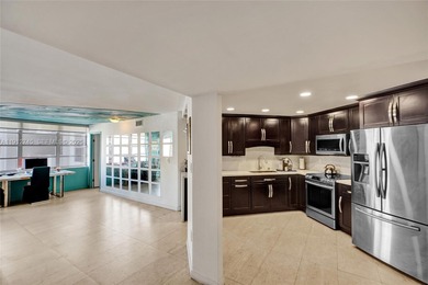 Step inside this beautifully designed 1-bedroom plus den, 1